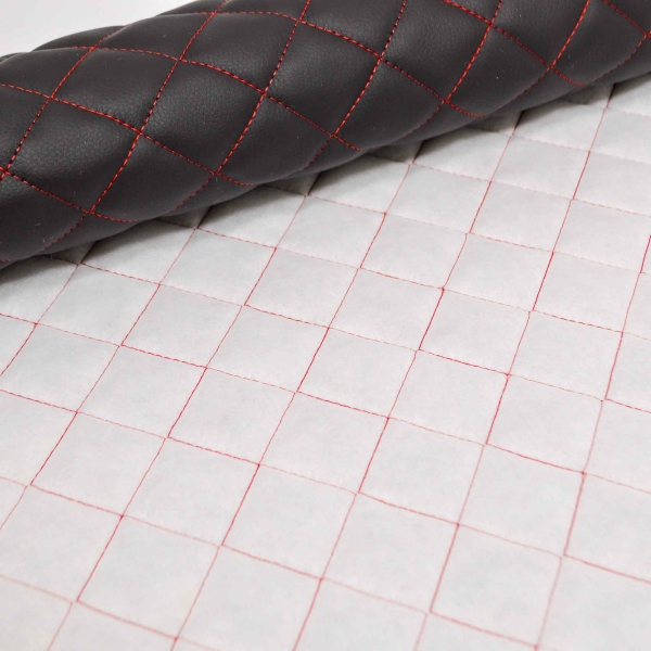 Kunstleder Stepper 1432 Stepper Lotus rote Steppung schwarz Stepper schwarz Kunstleder Lotus rot gesteppt schwarz Stepper Steppstoff rot schwarz wattiert abgesteppt gesteppt Möbelpolster Möbelpolsterstoff schwarz Kunstleder Lotus Stepper schwarz Kunstlede